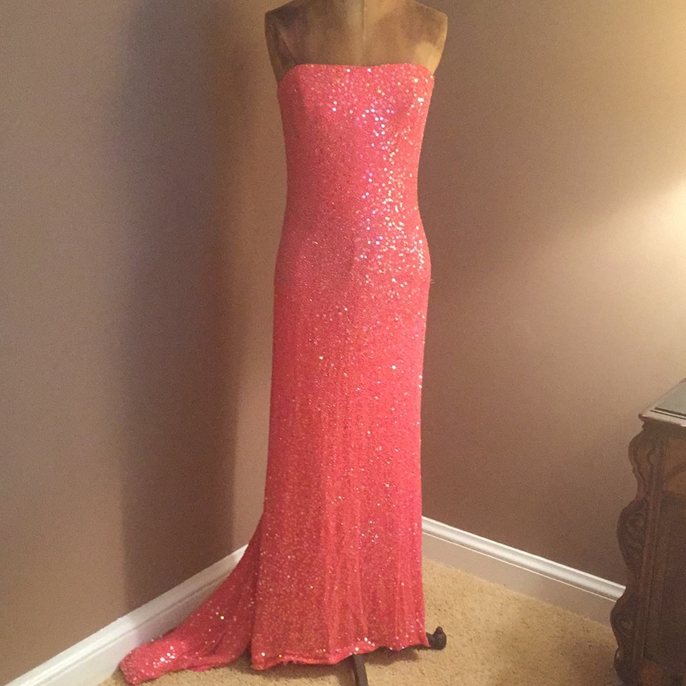 Gorgeous sequined gown with train